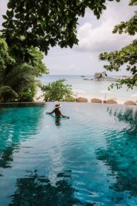 woman on body of water during daytime